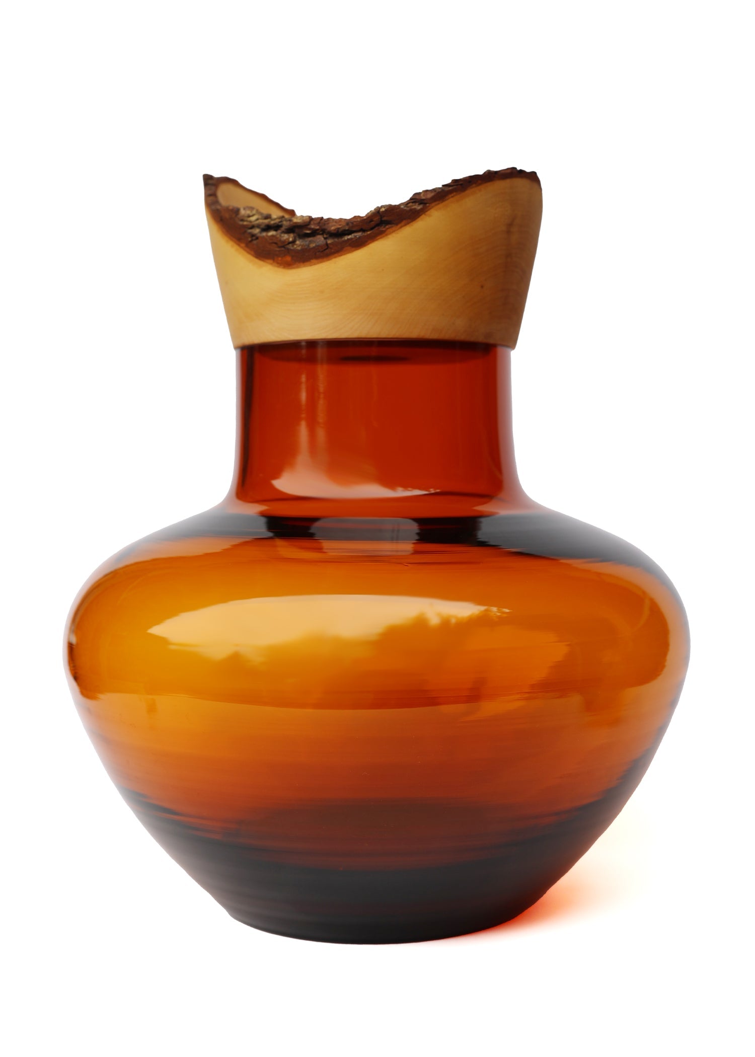 Big Bloom Stacking Vessel in Amber, showcasing a warm, golden hue and an elegant layered design.