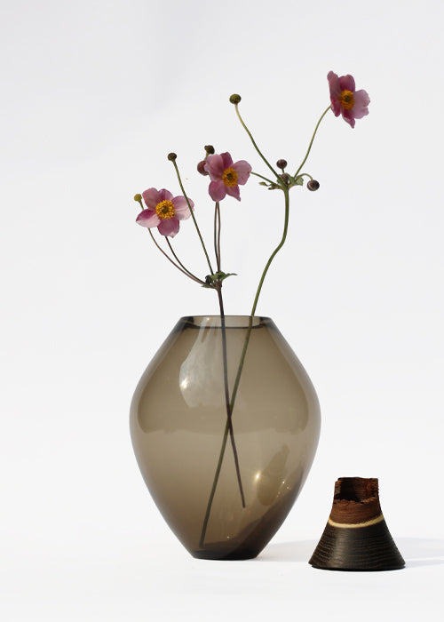 Matisse III Stacking Vessel unstacked, featuring a floral arrangement for a refined, modern look.