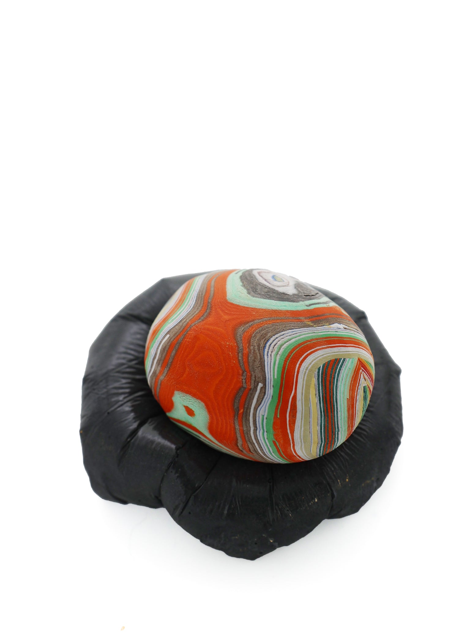 Paper Pebble in Big Black from above, a bold, larger version with a sleek black finish, making a statement in modern home decor.