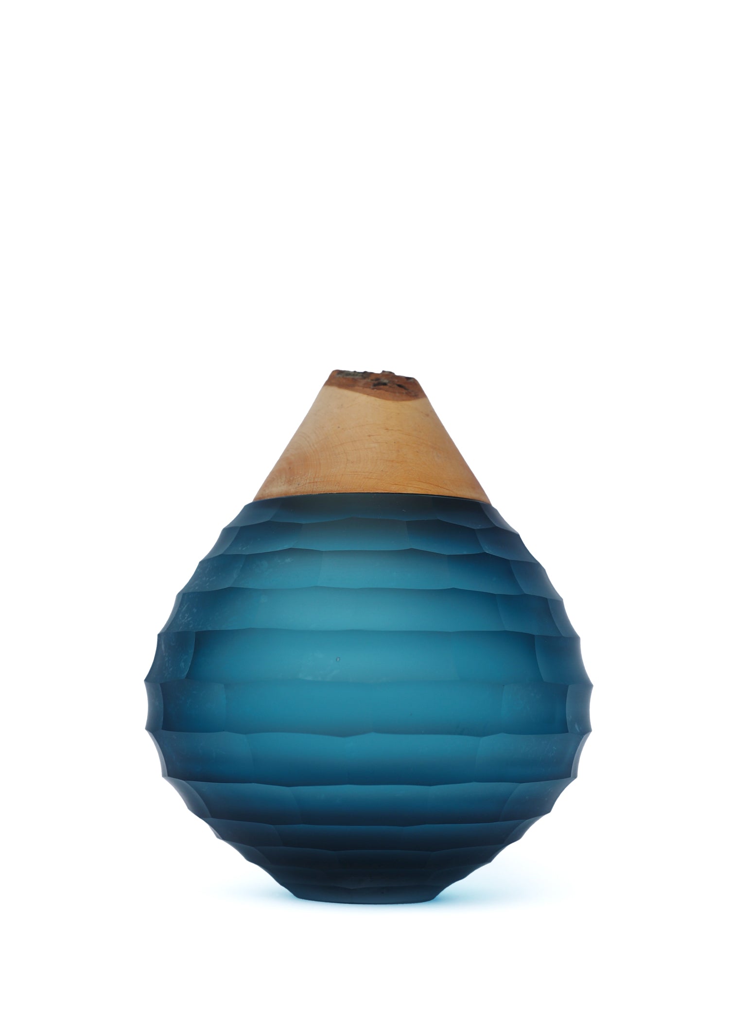 Stacking Vessel Sculpt in Blue, expertly cut with a diamond wheel to create intricate details and refined textures.