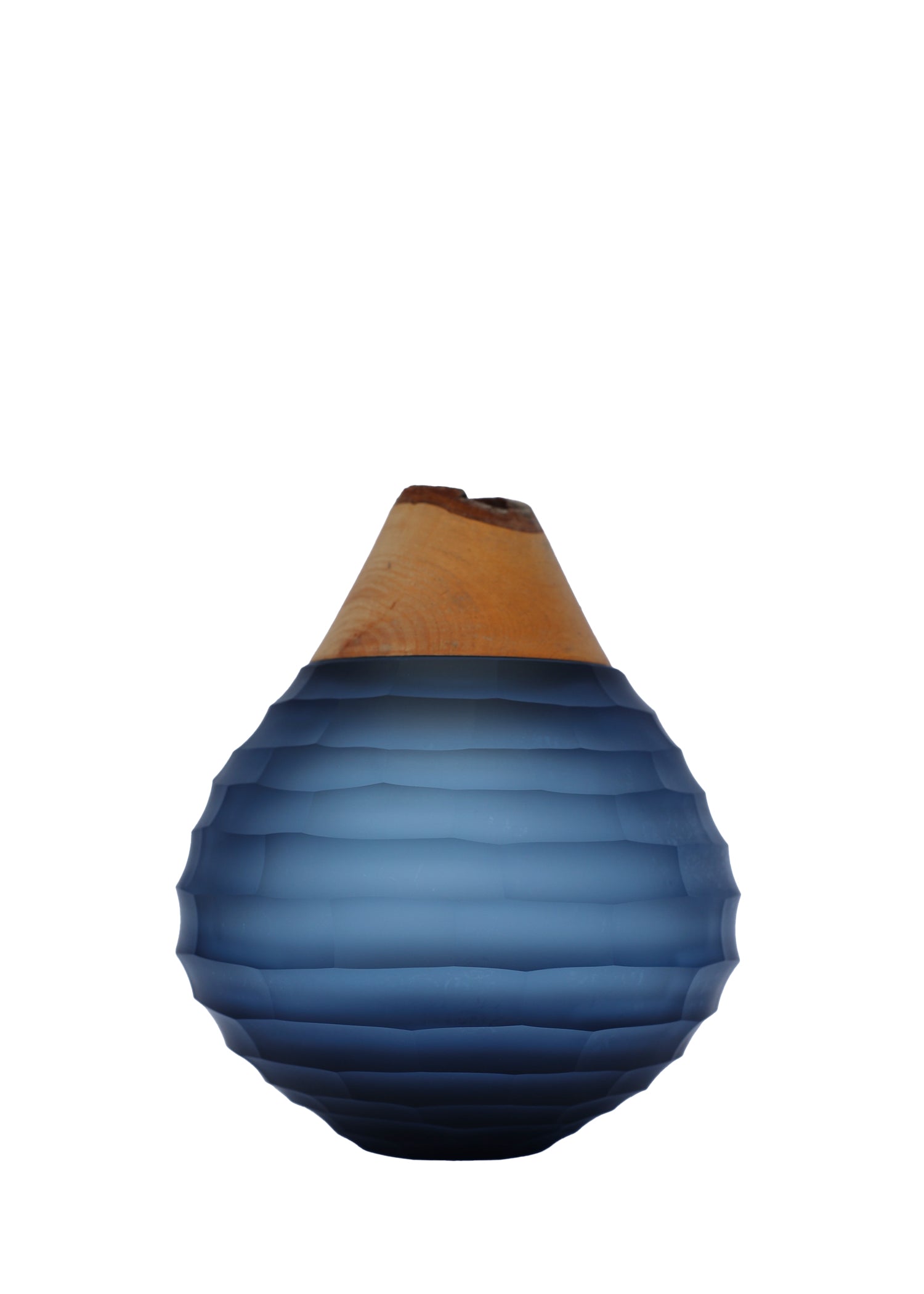Stacking Vessel Sculpt in Steal Blue, expertly cut with a diamond wheel to create intricate details and refined textures.