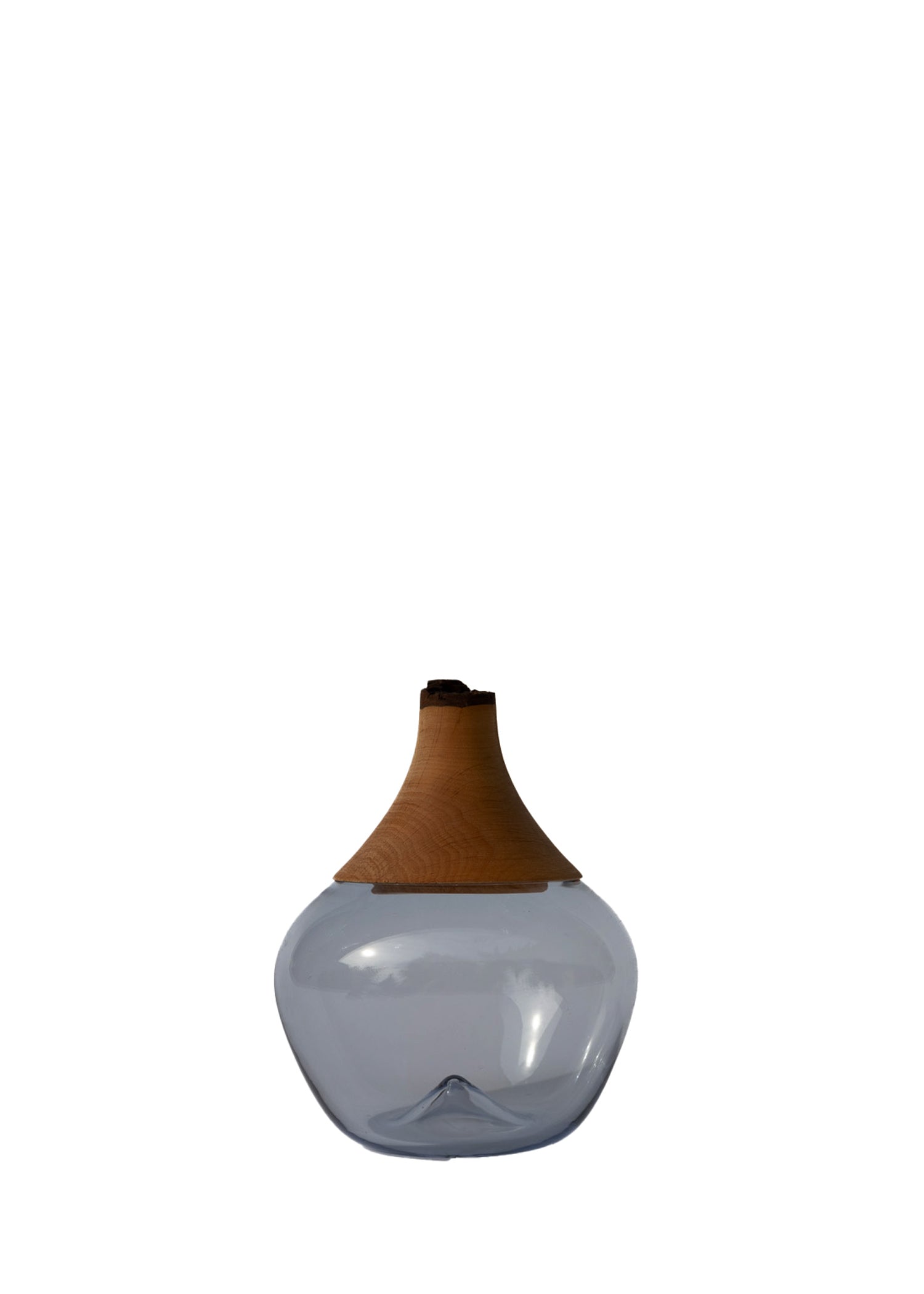 Apple Stacking Vessel Blue featuring a sleek and modern design, perfect for contemporary interiors.