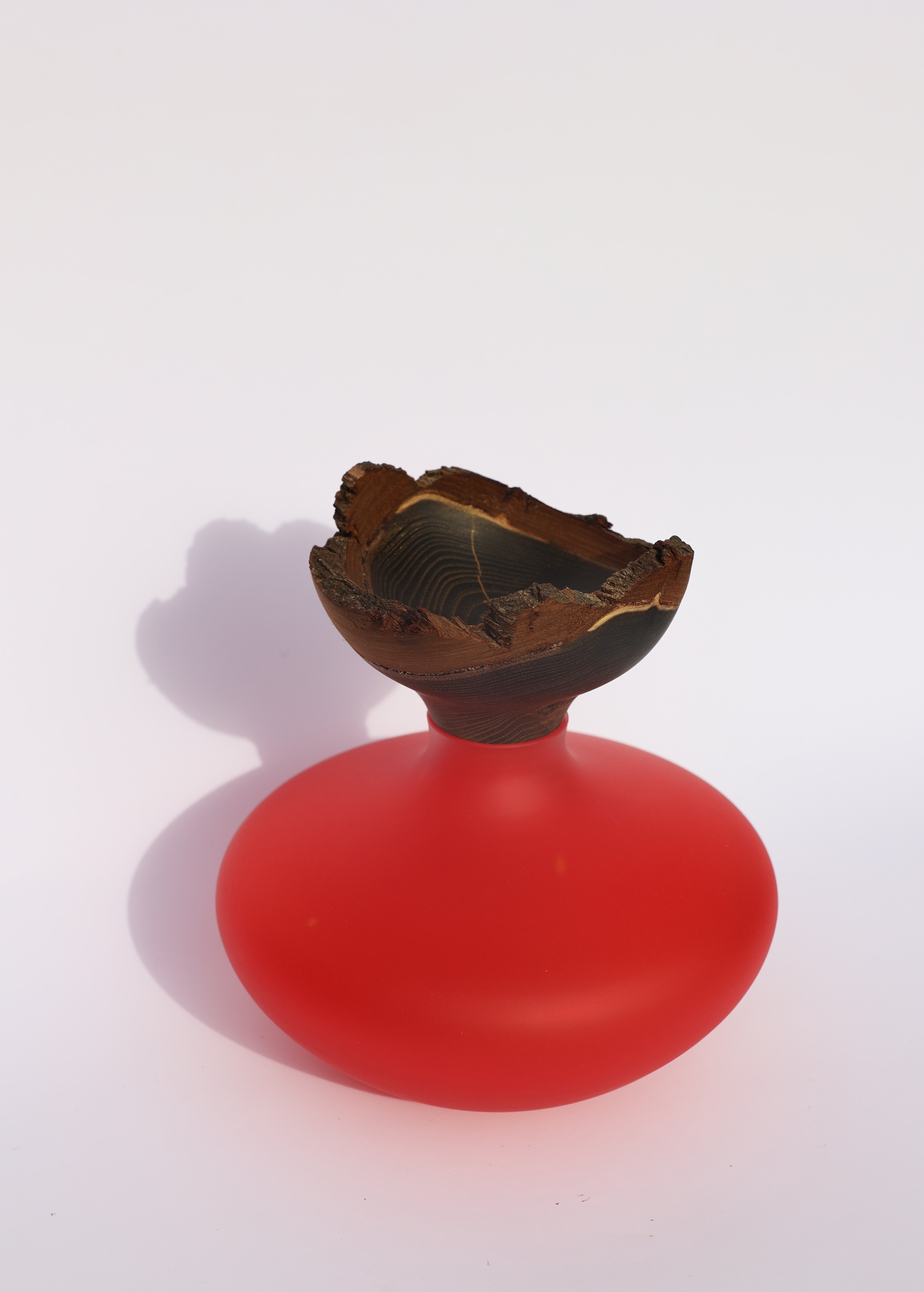 Stacking Vessel Bloom in SECOND edition with a Red Satin finish from above, designed to add a touch of elegance and bold color to any modern interior.