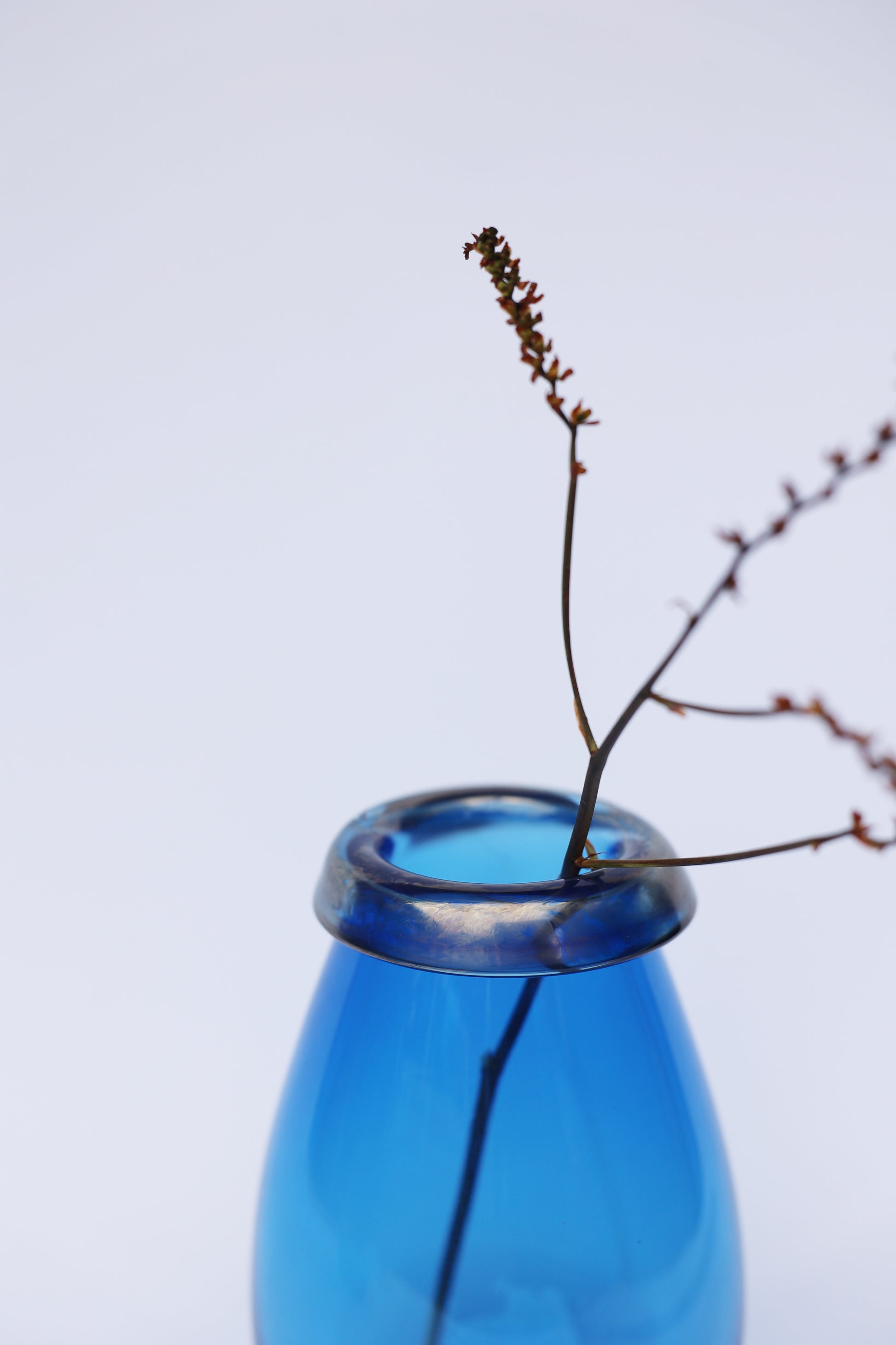 Ida Vase in Blue, medium size with a refined, clean shape and rich blue color, perfect for any modern space, detail.