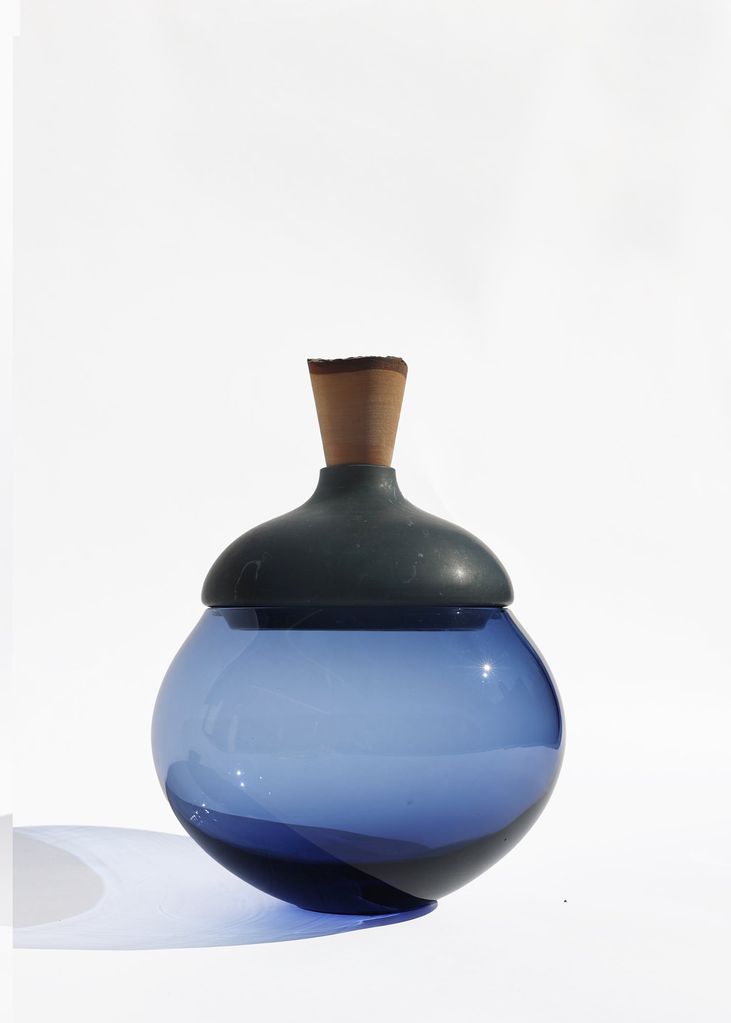  Istanbul Stacking Vessel in blue and black marble, a bold blend of colors that highlight the unique marble textures.