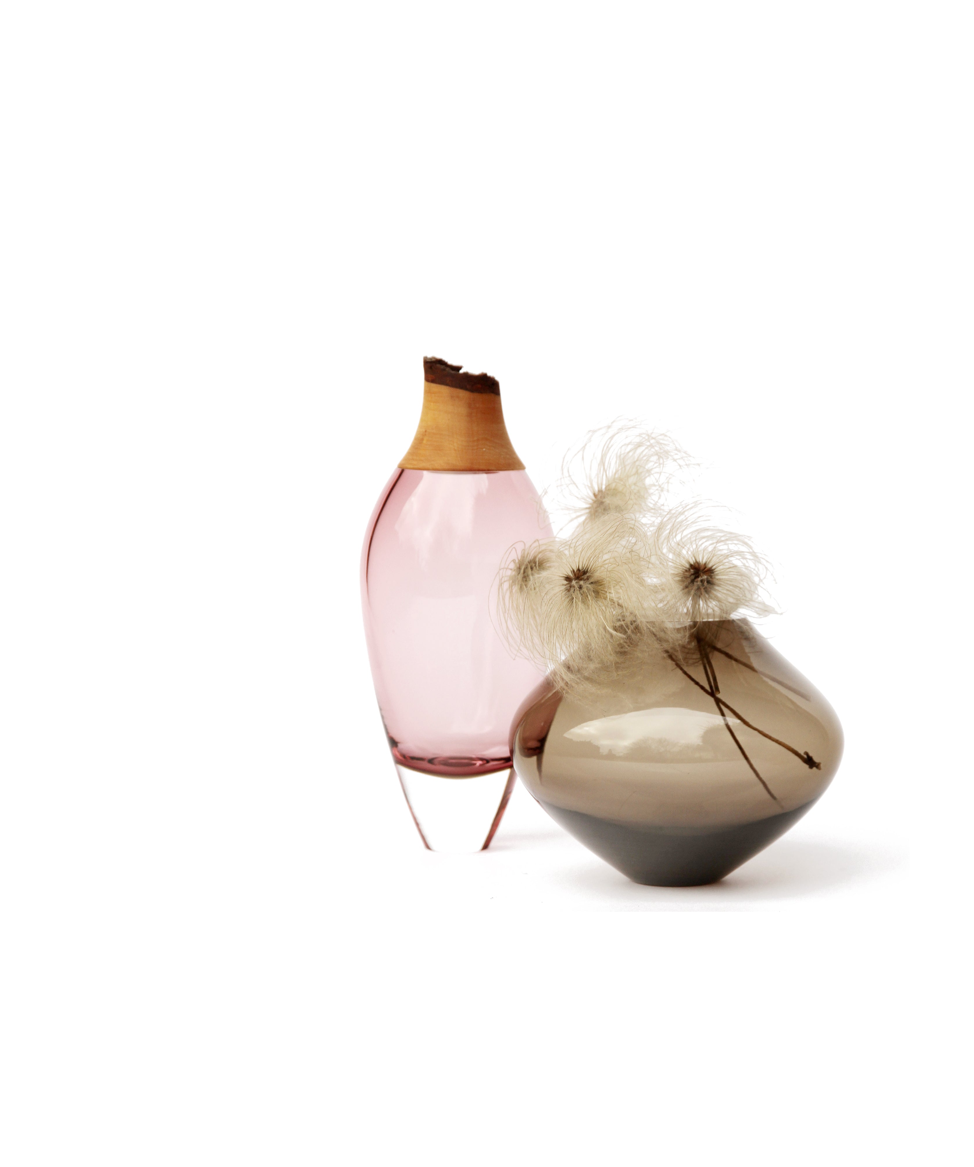 Matisse I Rose and II Smoke vases unstacked on a white background, showcasing their elegant design and color contrast.