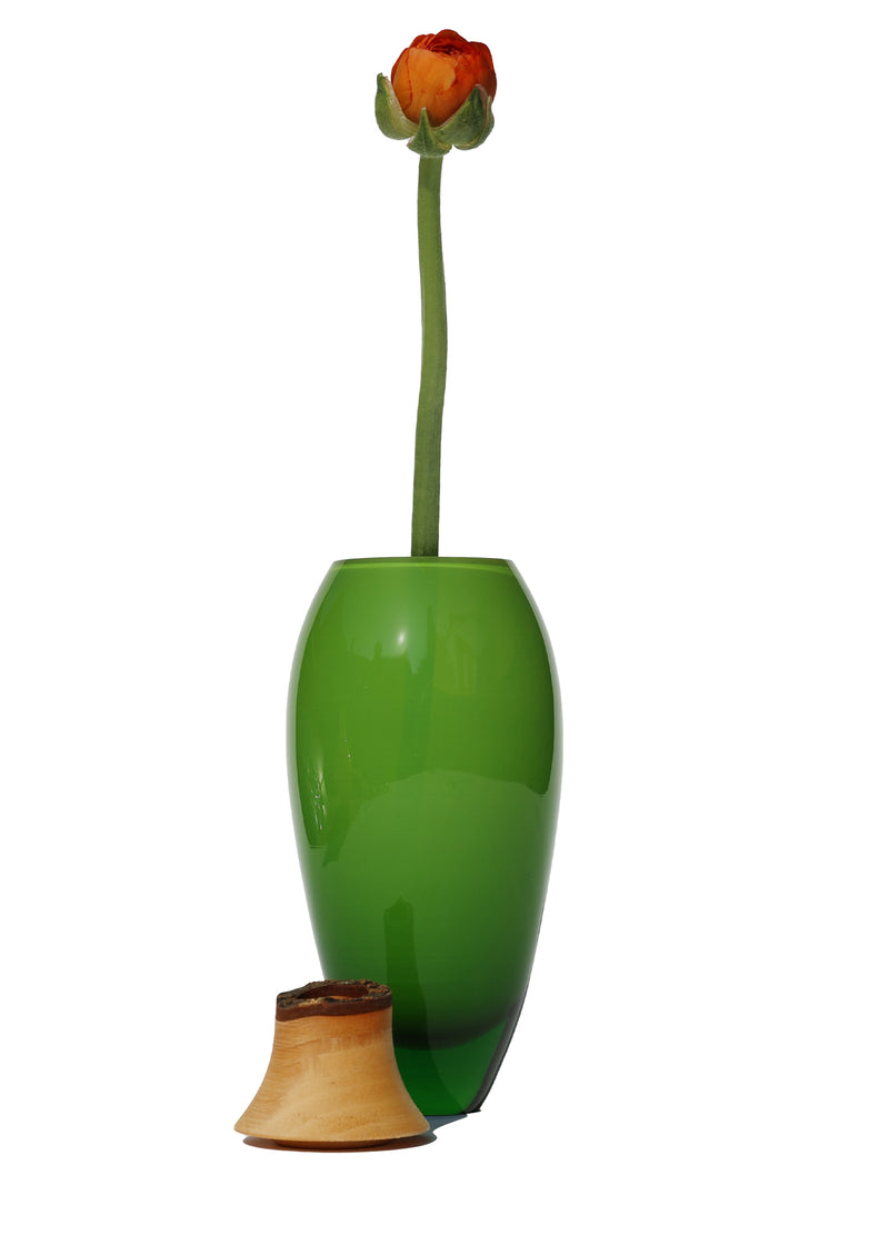 Matisse Poison Green glass vase unstacked with flower on white background.