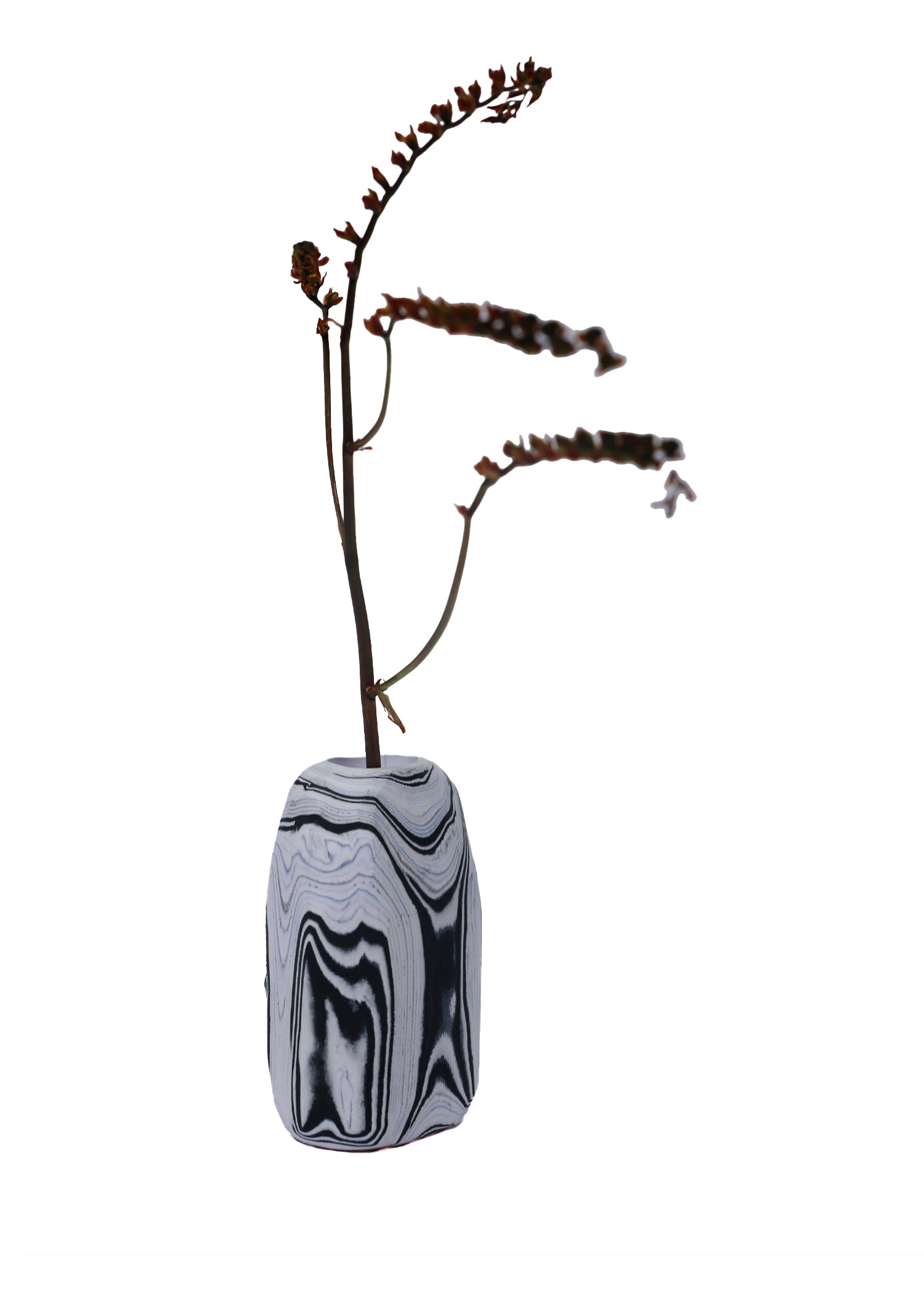 Paper Pebble Vase in Black & White with flower, featuring a high-contrast design that adds elegance and simplicity to contemporary interiors.